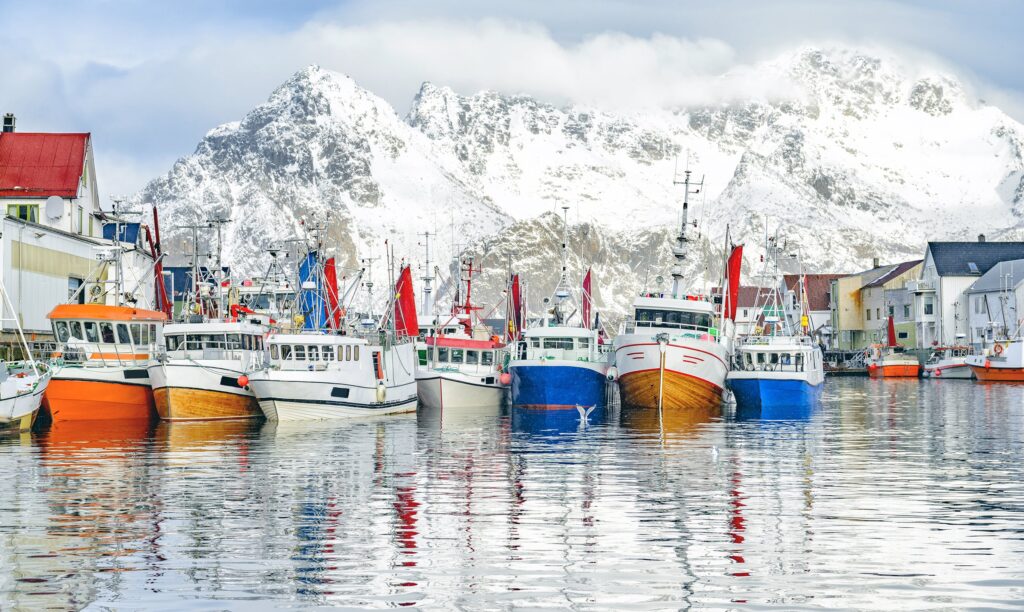 An image of boats anchored in a Nordic port